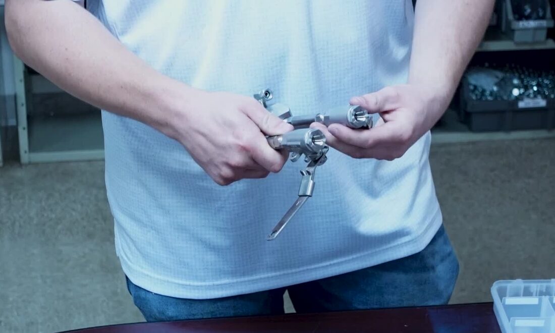 Gun block with ball valves during assembly walkthrough