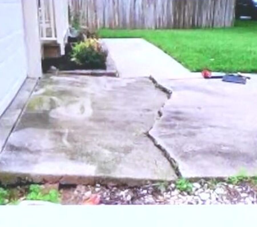Settled driveway slab