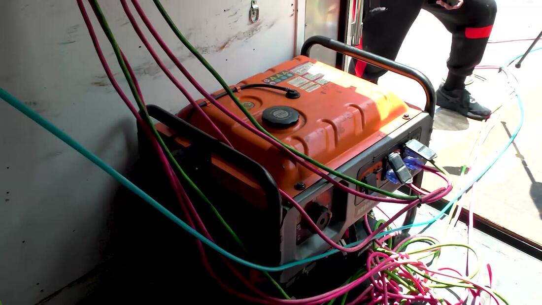 Generator and hoses in PolyBadger trailer