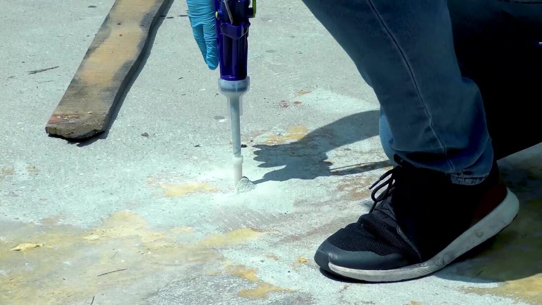 Gun injecting into slab